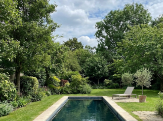 Pool concept with a compact lap-style layout and a quiet pale finish palette